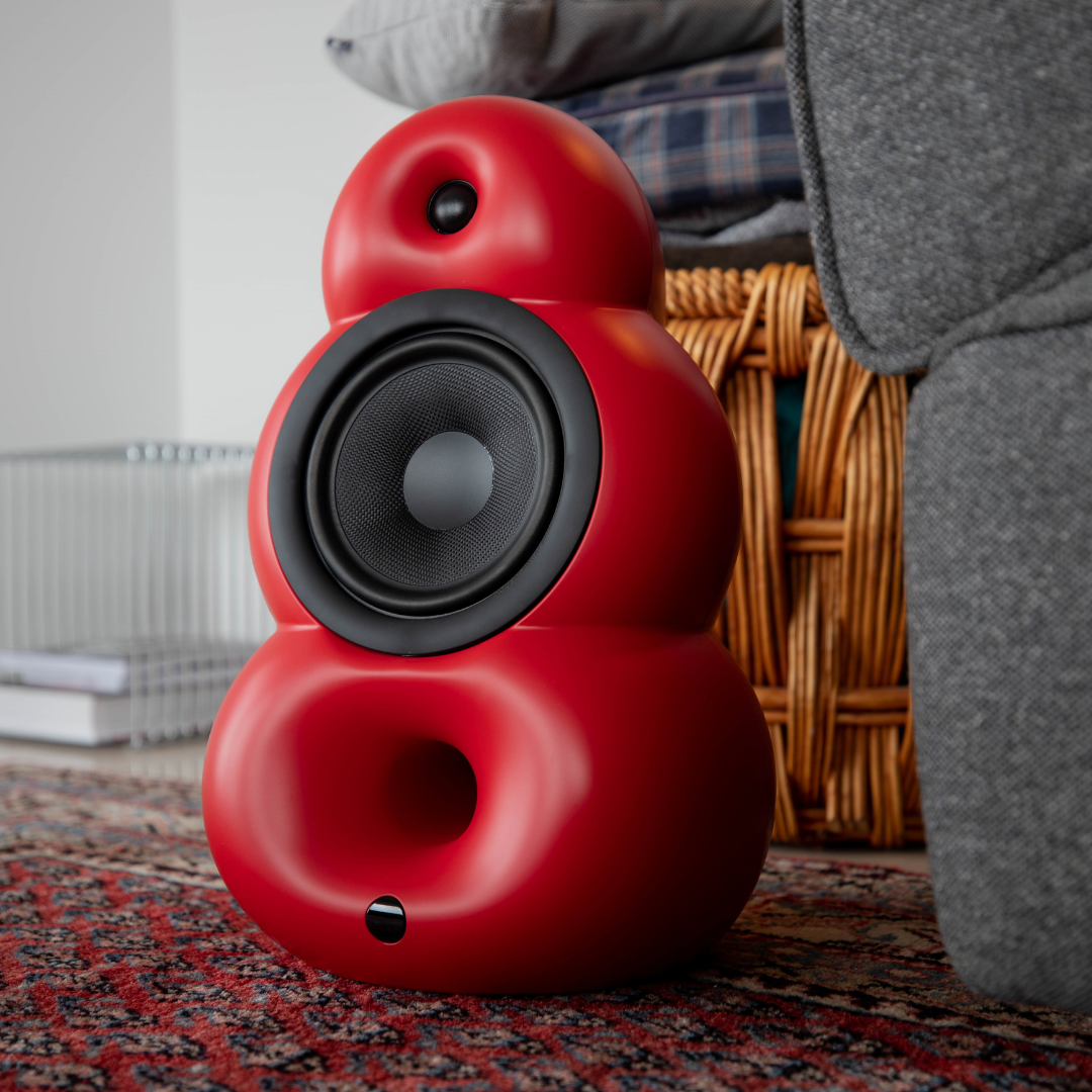 Scandyna HiFi Loudspeaker model BGP MK3 in matte red color placed on floor