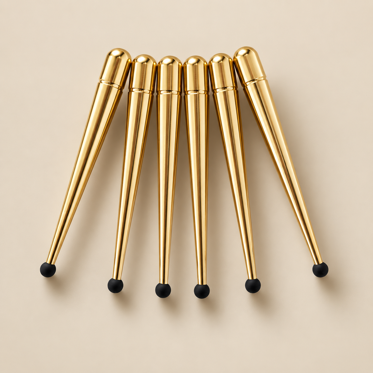 Scandyna golden speaker spikes, 6-pack, with black rubber tips.